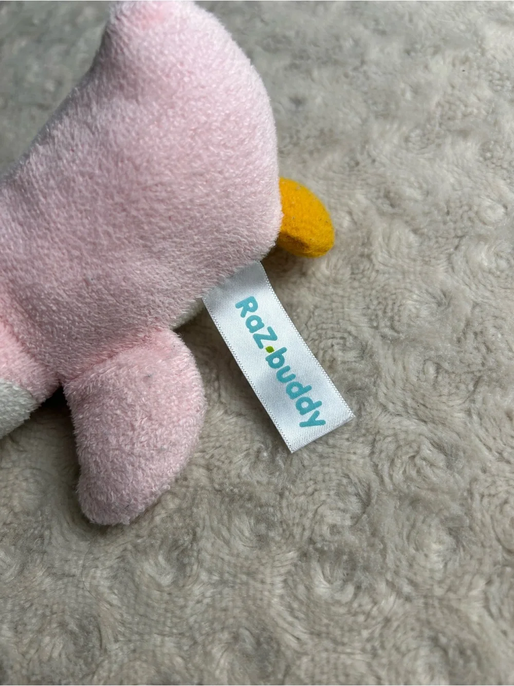 RaZbuddy Pink Penguin Plush Pacifier Holder White Orange RaZbaby Lovey